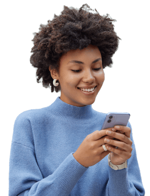 glad-young-woman-with-curly-bushy-hair-holds-modern-mobile-phone-downloads-amazing-application-surfs-social-networks-wears-casual-blue-jumper_edit 1